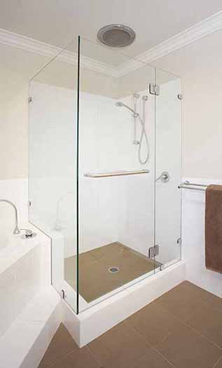 Frameless corner shower enclosure