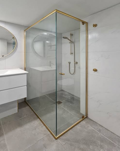 Gold framed corner enclosure